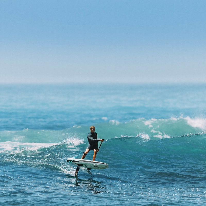 Core Chase beim SUP in der Welle